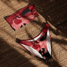 Cargar imagen en el visor de la galería, Red and black patterned bikini set on a textured surface