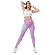 Load image into Gallery viewer, Woman wearing pink and purple patterned leggings with a white sports bra on a white background