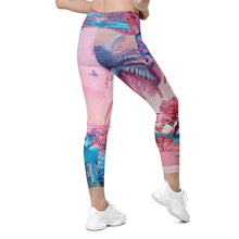 Load image into Gallery viewer, Colorful leggings with a blue pony and floral design worn by a person on a white background