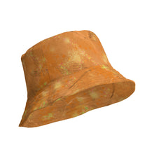 Load image into Gallery viewer, Orange bucket hat with a textured pattern on a white background