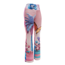 Load image into Gallery viewer, Colorful leggings with nature-themed design on a white background
