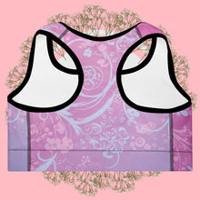 Load image into Gallery viewer, White bikini top with purple and pink patterned background
