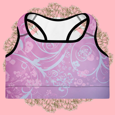 Purple sports bra with floral pattern on a pink background