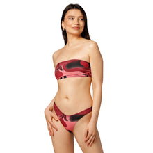 Cargar imagen en el visor de la galería, Woman wearing a red and black patterned bikini on a white background

