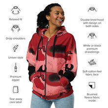Cargar imagen en el visor de la galería, Person wearing a red hoodie with black graphics, surrounded by features of the hoodie.
