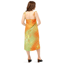 Load image into Gallery viewer, Woman wearing a colorful dress with a white background
